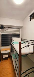 Postel nebo postele na pokoji v ubytování Fully-furnished 2BR Condo in Pasig, Cainta