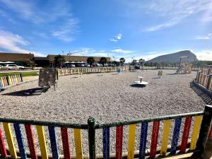 an empty playground with a fence at Sol & Mar in El Médano