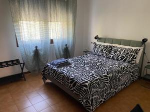 Ένα ή περισσότερα κρεβάτια σε δωμάτιο στο True Italian Stay