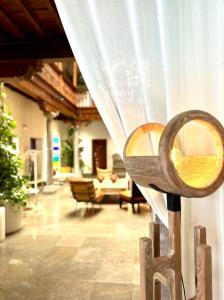 a view of a living room with a curtain at Gar Anat Hotel Boutique in Granada