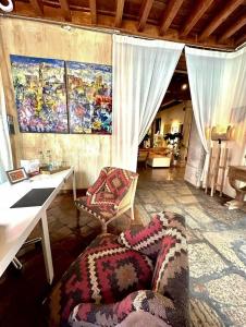 a living room with a couch and a table at Gar Anat Hotel Boutique in Granada