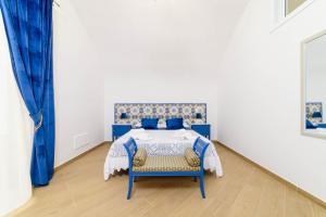 Кровать или кровати в номере Casa vacanze Mura Antiche