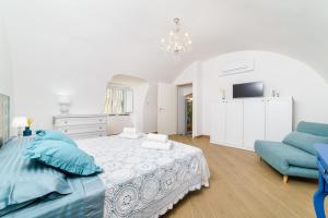 Кровать или кровати в номере Casa vacanze Mura Antiche