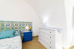 Кровать или кровати в номере Casa vacanze Mura Antiche