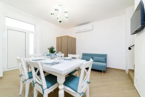 Телевизор и/или развлекательный центр в Casa vacanze Mura Antiche