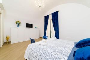 Кровать или кровати в номере Casa vacanze Mura Antiche