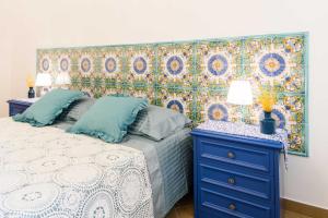 Кровать или кровати в номере Casa vacanze Mura Antiche