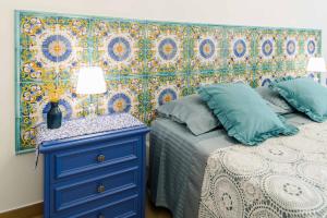 Кровать или кровати в номере Casa vacanze Mura Antiche