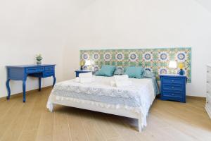 Кровать или кровати в номере Casa vacanze Mura Antiche
