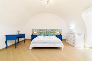 Кровать или кровати в номере Casa vacanze Mura Antiche