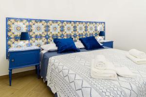 Кровать или кровати в номере Casa vacanze Mura Antiche