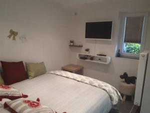 Postel nebo postele na pokoji v ubytování appartement très chaleureux cocooning et calme