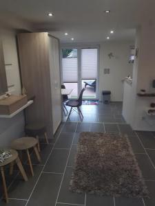 Kuchyň nebo kuchyňský kout v ubytování appartement très chaleureux cocooning et calme