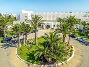 an aerial view of a building with palm trees at TUI BLUE Palm Beach Hammamet - All inclusive in Hammamet