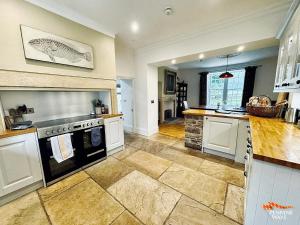 Η κουζίνα ή μικρή κουζίνα στο Bridge End House - Pet Friendly