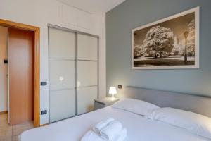 Posteľ alebo postele v izbe v ubytovaní Easylife - Classic and Comfy Porta Romana Flat