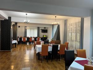 Posezení v ubytování Pensiunea Cabana Veverita Valea Doftanei