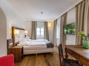 Voodi või voodid majutusasutuse Hotel Gasthof Blaue Quelle toas