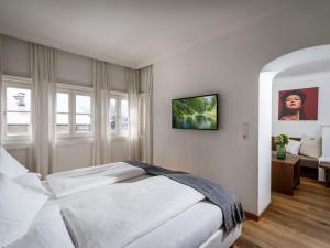Voodi või voodid majutusasutuse Hotel Gasthof Blaue Quelle toas