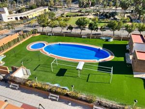 Bazén v ubytování ACV - Torremar-2ª linea planta 5 Frontal 4 nebo v jeho okolí