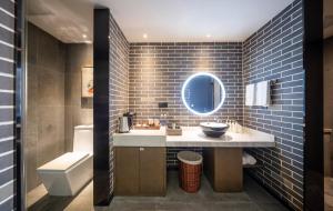 Ein Badezimmer in der Unterkunft Mehood Lestie, Zhangbaliu Road, Xi'an High-tech Zone