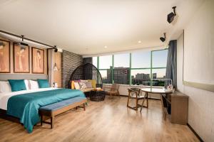 Ein Bett oder Betten in einem Zimmer der Unterkunft Mehood Lestie, Zhangbaliu Road, Xi'an High-tech Zone