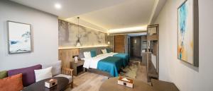 Ein Bett oder Betten in einem Zimmer der Unterkunft Mehood Lestie, Zhangbaliu Road, Xi'an High-tech Zone