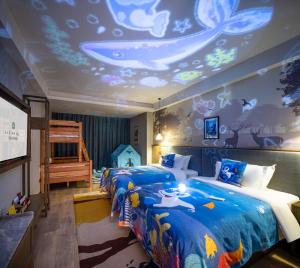 Ein Bett oder Betten in einem Zimmer der Unterkunft Mehood Lestie, Zhangbaliu Road, Xi'an High-tech Zone