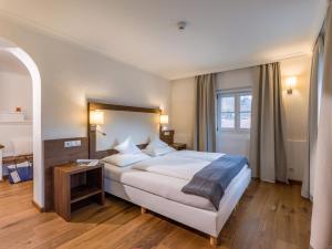 Voodi või voodid majutusasutuse Hotel Gasthof Blaue Quelle toas
