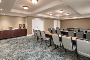 a conference room with a long table and chairs at Homewood Suites by Hilton Wallingford-Meriden in Wallingford +30 photos