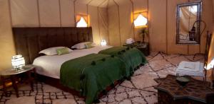 Postel nebo postele na pokoji v ubytování Royal Sands Camp