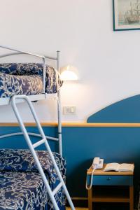 Postel nebo postele na pokoji v ubytování Hotel Golf