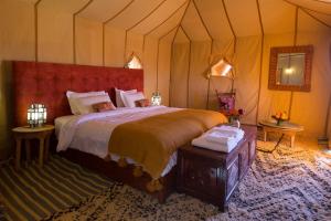 Postel nebo postele na pokoji v ubytování Royal Sands Camp