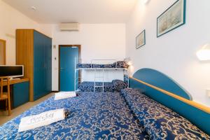 Postel nebo postele na pokoji v ubytování Hotel Golf