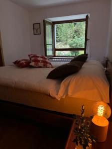 Postel nebo postele na pokoji v ubytování Hotel Miramonti