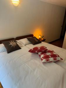 Postel nebo postele na pokoji v ubytování Hotel Miramonti