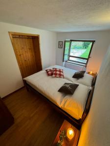 Postel nebo postele na pokoji v ubytování Hotel Miramonti