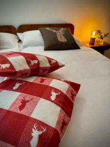 Postel nebo postele na pokoji v ubytování Hotel Miramonti
