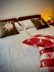Postel nebo postele na pokoji v ubytování Hotel Miramonti