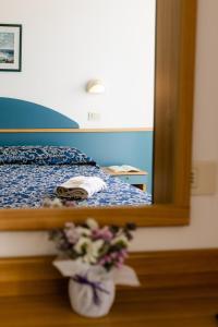 Postel nebo postele na pokoji v ubytování Hotel Golf