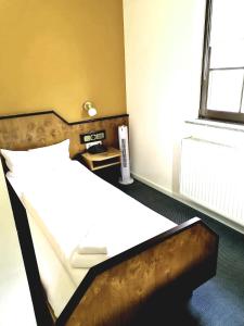 Postel nebo postele na pokoji v ubytování Haus zur Waldbrücke