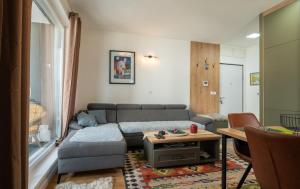 Khu vực ghế ngồi tại Apartment Bjelasnica Vucica Lodge