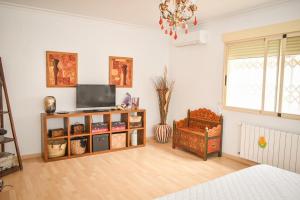 Μια τηλεόραση ή/και κέντρο ψυχαγωγίας στο Sunny House La Eliana