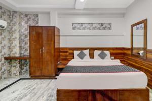 Ένα ή περισσότερα κρεβάτια σε δωμάτιο στο Hotel O ASA AGRA +20 φωτογραφίες