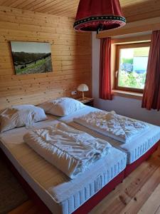 Postel nebo postele na pokoji v ubytování Bauernhaus Viehhauser