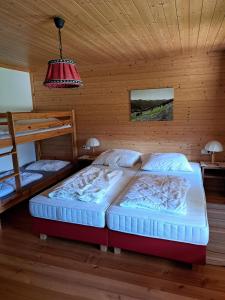 Postel nebo postele na pokoji v ubytování Bauernhaus Viehhauser