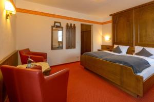 Postel nebo postele na pokoji v ubytování Hotel Kurpark