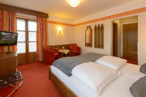 Postel nebo postele na pokoji v ubytování Hotel Kurpark
