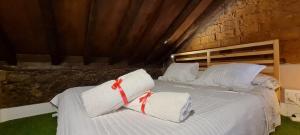 Postel nebo postele na pokoji v ubytování B&B La Laguna