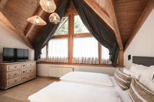 Posteľ alebo postele v izbe v ubytovaní Hotel Löwenhof